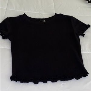 A small, cute, never worn, black crop top